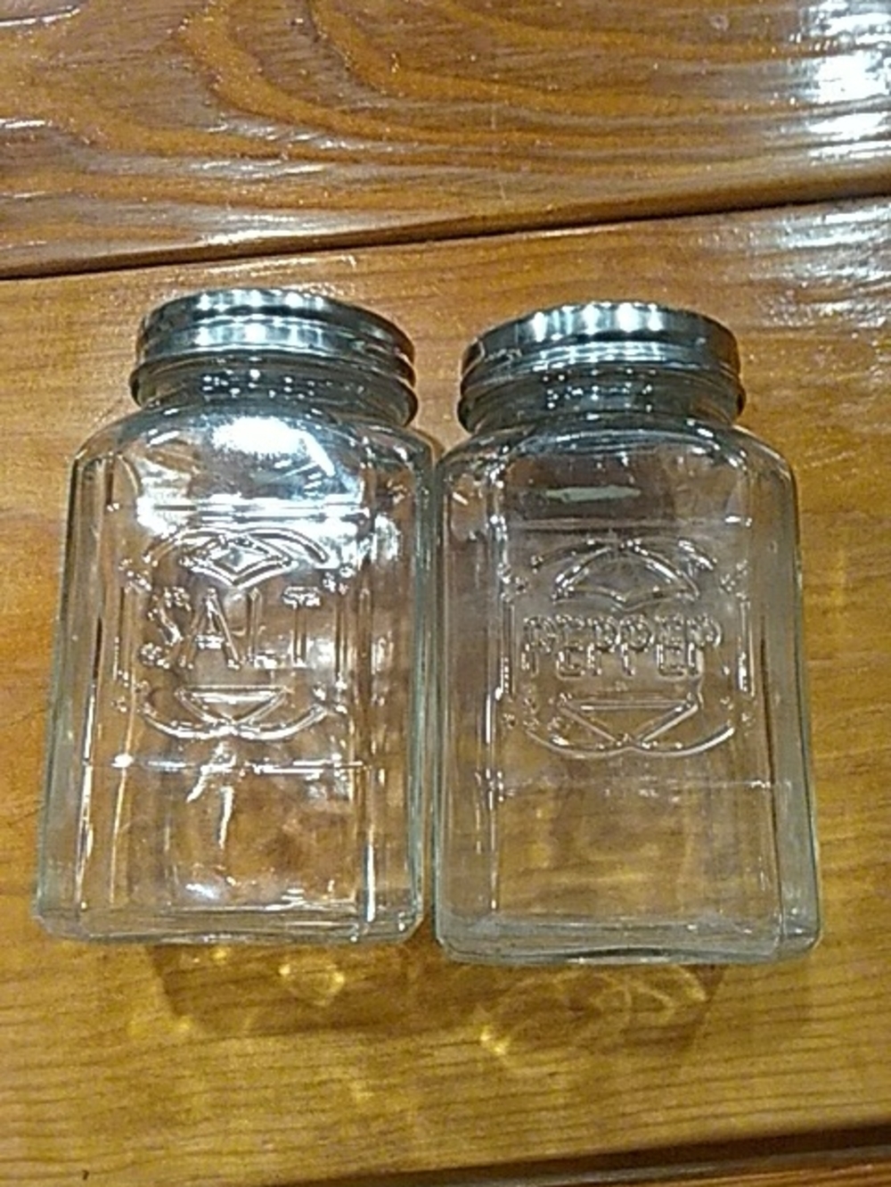 Clear Glass Salt and Pepper Shakers with Silver Tops